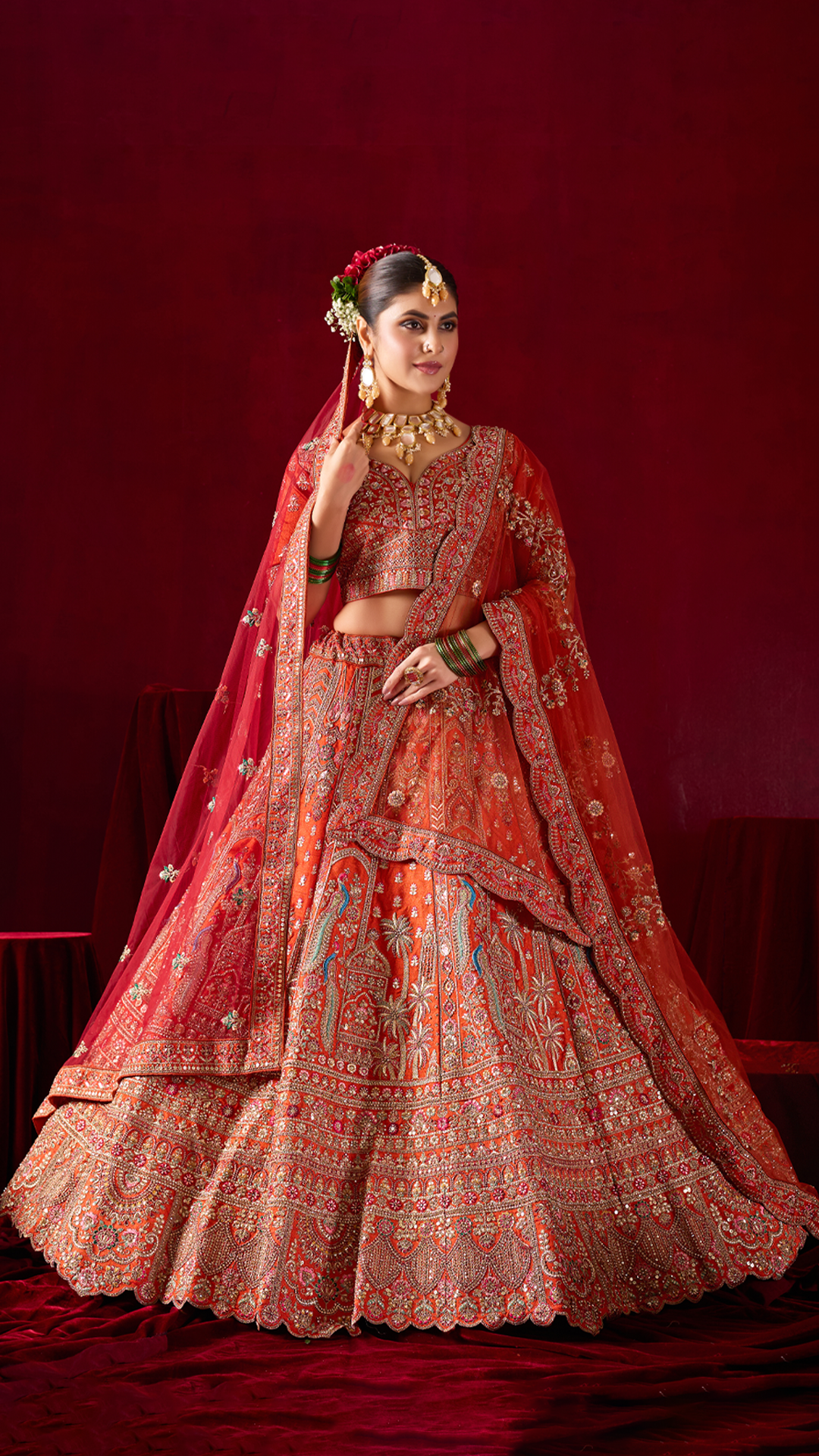 Bright Orange Designer Bridal Lehenga with Embroidered Borders